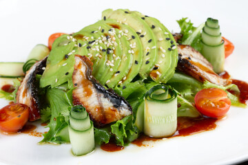 Salad with eel, avocado and herbs.