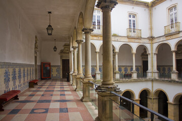 Arcade of a courtyard of famous Coimbra University, Portugal