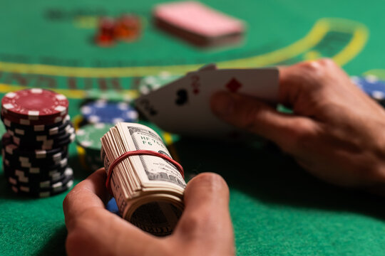 The player makes a bet in poker.