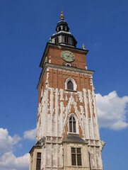 Fototapeta na wymiar the high tower of historical Town Hall in Krakow's center