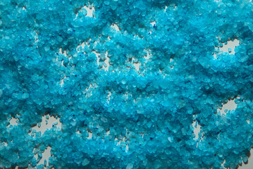 Blue bath salt crystals. Background, texture, wallpaper.	