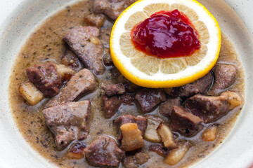 venison goulash with lemon and cranberries