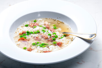 broth of smoked meat with green peas and rice