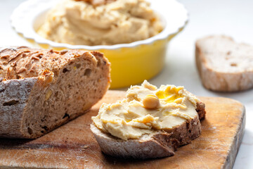 still life of hummus with bread