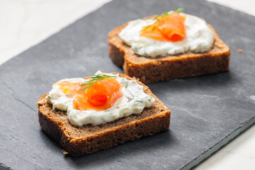 whole grain bread with dill spread and smoked salmon