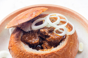 beef goulash in loaf of bread - obrazy, fototapety, plakaty