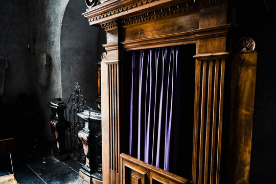 Old wooden confession booth at a church