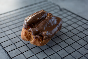 A view of a chocolate buttermilk donut.