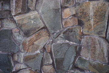 Stone wall close up, stone background.
