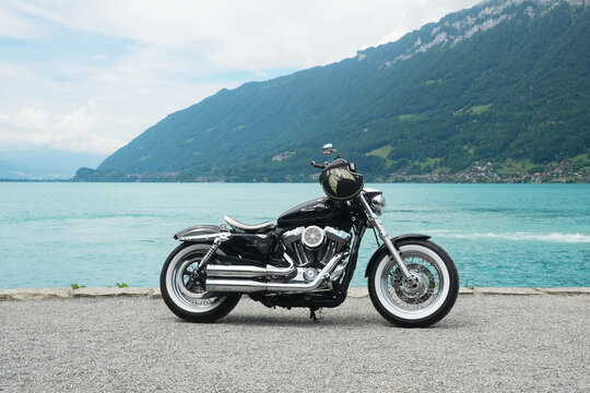 "Bern, Switzerland-Circa June, 2022: A picture of Harley Davidson Motorbike at Iseltwald."