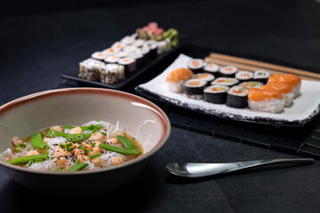 Various dishes of Asian cuisine with typical sushi