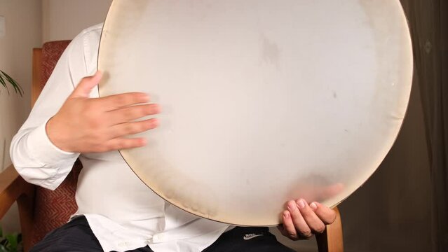 man playing daf