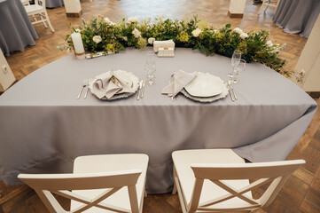 Wedding presidium for the newlyweds, on the wedding day at the party.