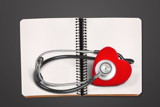 Social Determinants Of Health concept, book with stethoscope
