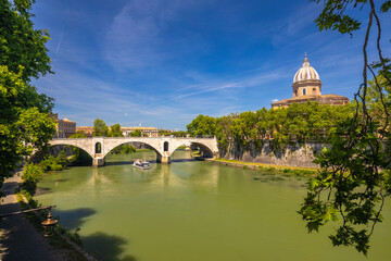 Fototapeta na wymiar Tiber river with ancient bridge in Rome, Italy, Europe.