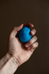 Chicken egg in hand