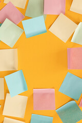 Blank sticky notes on yellow background
