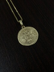 Gold Bitcoin Coin - Wooden Table - Crypto Amulet - Golden - Necklace - BTC Symbol
