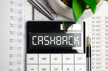 A calculator with the word CASHBACK on the display