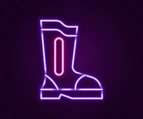 Glowing neon line Fire boots icon isolated on black background. Colorful outline concept. Vector