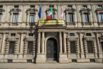 Fototapeta na wymiar Milan - Italy - June 11 2022: written for Giulio Regeni italian student killed in Egipt. Palazzo Marino, Milan's city hall, Italy