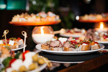 Gourmet plate with delicious snacks in restaurants for banquet celebrations
