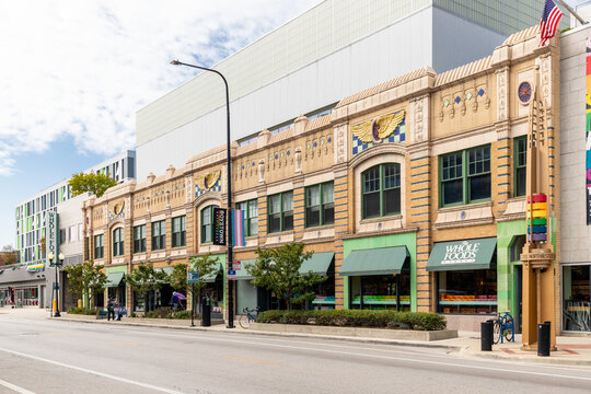 CHICAGO, IL, USA - SEPTEMBER 17, 2020: A Whole Foods grocery store in the Boystown neighborhood in Chicago with LGBTQ rainbow pride pillars in standing on the sidewalk.