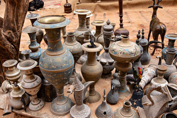 Fototapeta na wymiar Souvenir shop in Petra ancient town, old looking vases and jars for sale, Wadi Musa, Jordan