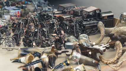 Fototapeta premium Georgian traditional Kantsi and other souvenirs and retro items for sale at the flea market, Tbilisi, Georgia. High quality photo
