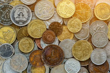 Background of Euro coins money.Numismatics.United kingdom Pound coin.US coins.Coins of different...