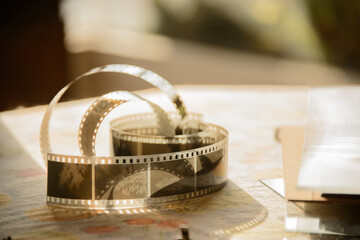 close up of a film in the afternoon golden hour on a table