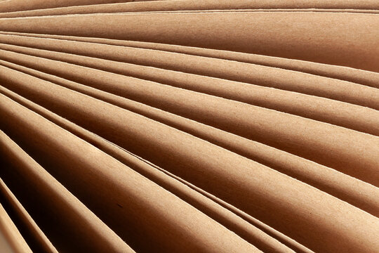 Kraft sheets of paper close-up. Abstract natural neutral background
