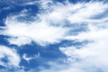 Bright blue sky with white clouds