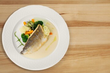 Tasty fresh fish in a restaurant for family dinner.