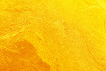 gold slate stone background or texture. gold stone
