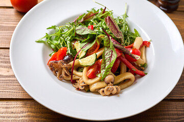 Vegetable salad on a large white plate