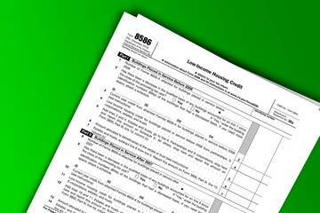 Obraz premium Form 8586 documentation published IRS USA 10.21.2016. American tax document on colored