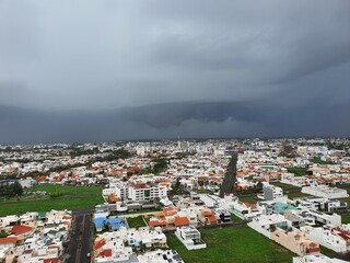 time clouds over city