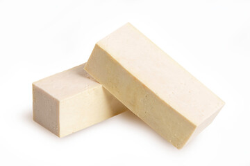 Piece of tofu cheese isolated on white background.
