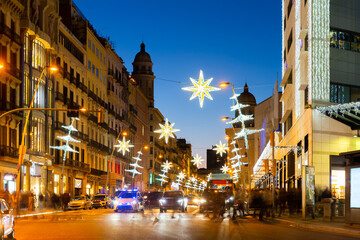 Fototapeta na wymiar Photo of streets of Barcelona in evening during christmas time.