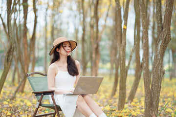 girl uses a laptop computer