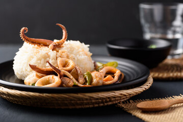 Stir fried squid with salted egg york and cooked rice, Thai food