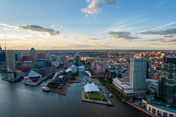 Fototapeta na wymiar Aerial Drone View of Baltimore City Inner Harbor before Sunset with Blue Skies