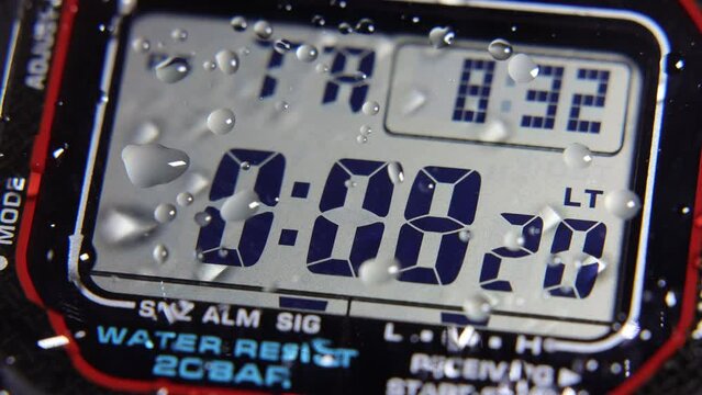 LCD display of a tough sports watch with running timer and stopwatch 
