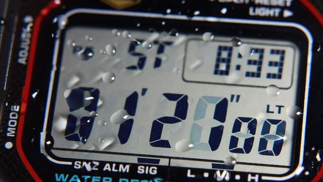 LCD display of a tough sports watch with running timer and stopwatch 
