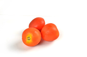 Fresh tomatoes use as cooking ingredients isolated in white background