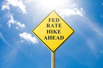 Fed Rate Hike Ahead Caution Sign sky Background