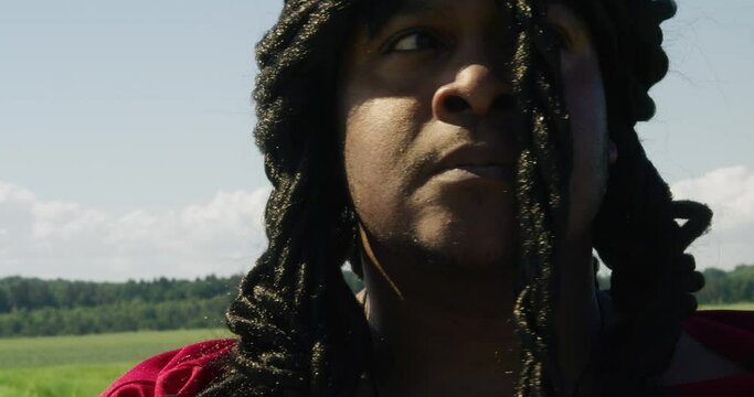 Samson looking around and powerfully roaring towards camera, Biblical character with long dreads, Israelite warrior and judge, black male in old testament, Christian