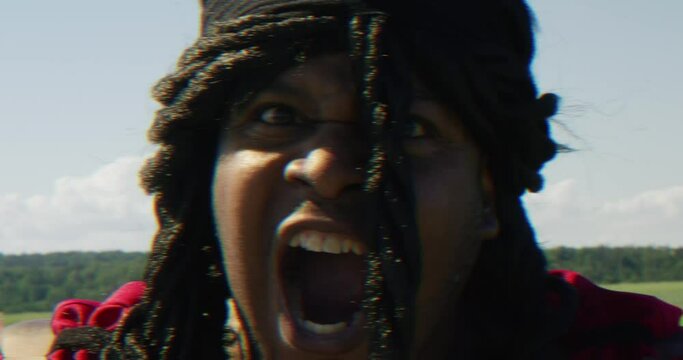 Samson producing an earth shaking roar towards screen, Biblical character with long dreads, Israelite warrior and judge, black male in old testament, Christian
