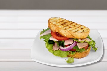 DÃ¶ner Kebab Doner Kebap fast food snack in flatbread on a wooden board desk